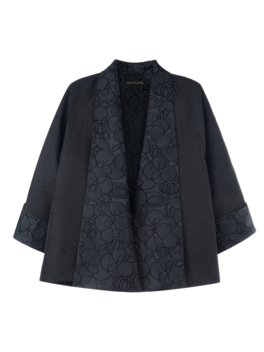Unisex black jacquard jacket with floral and geometric patterns by Lola Clavel Atelier, inspired by Japanese silhouettes