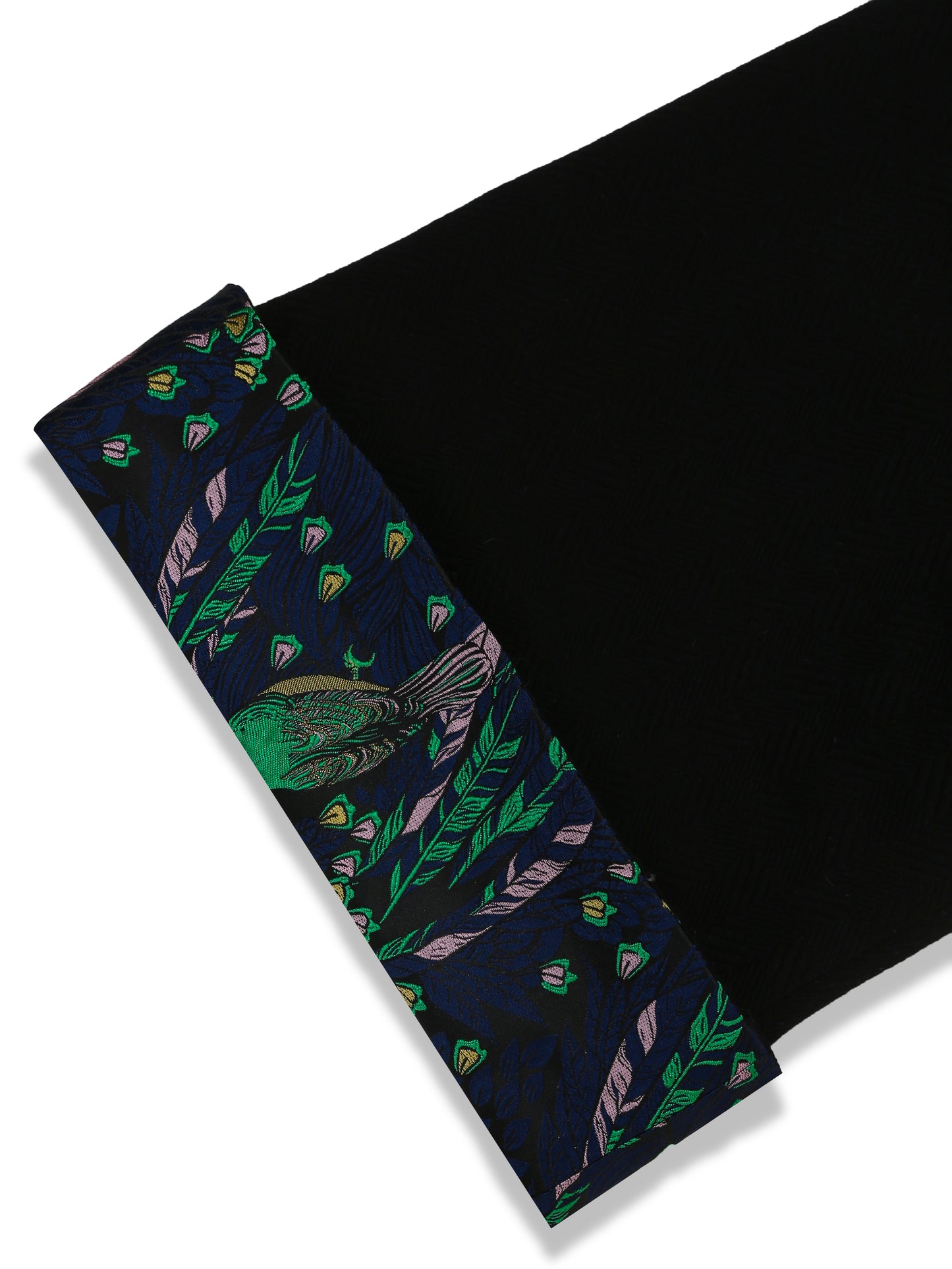 Bottom sleeve detail of the reversible brocade jacket, highlighting the clean finish and peek of the blue jacquard lining with vibrant bird motifs