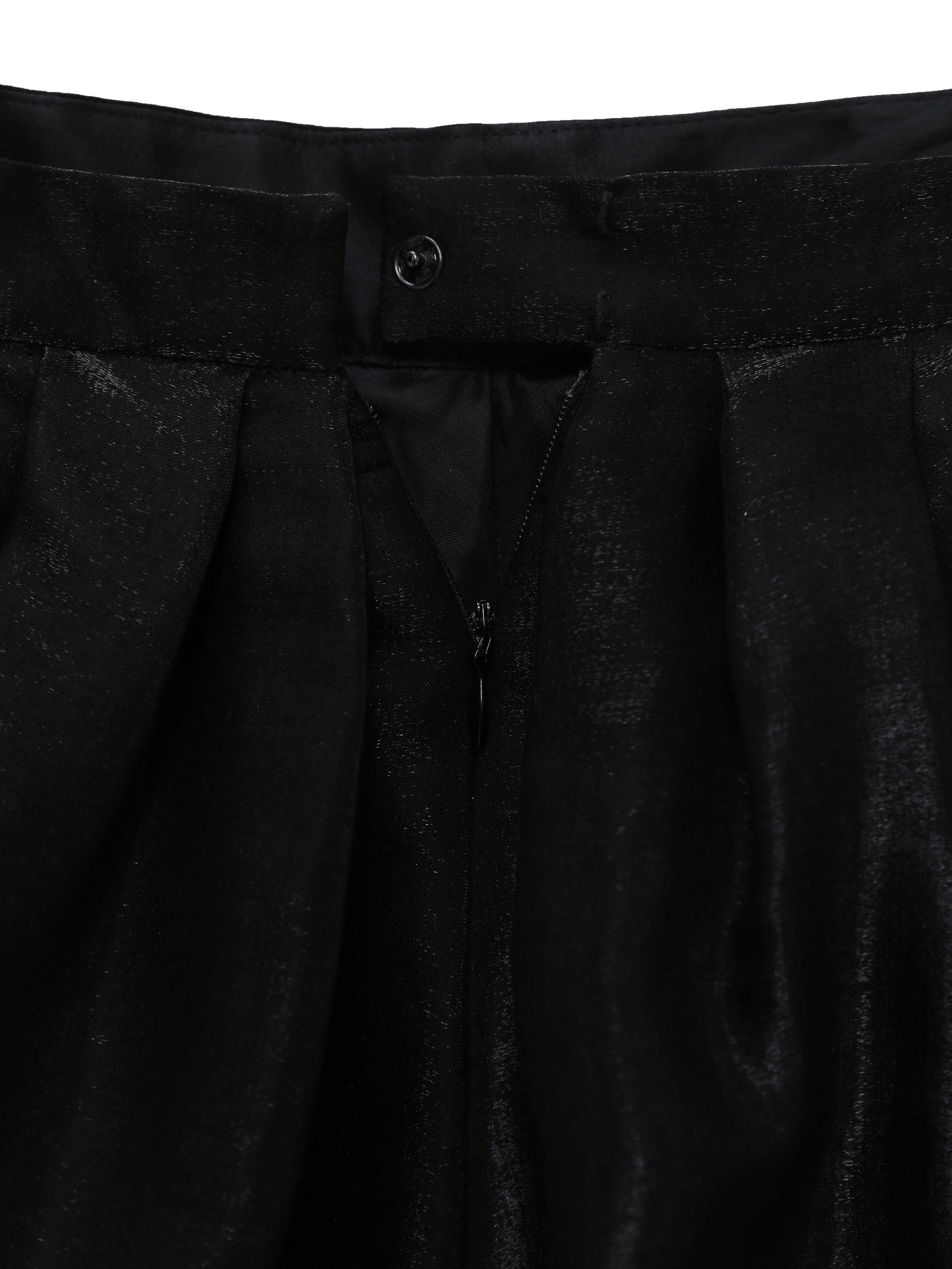 Detailed close-up back closing of metallic black draped fabric, soft sheen and fluid texture in designer skirt by Lola Clave