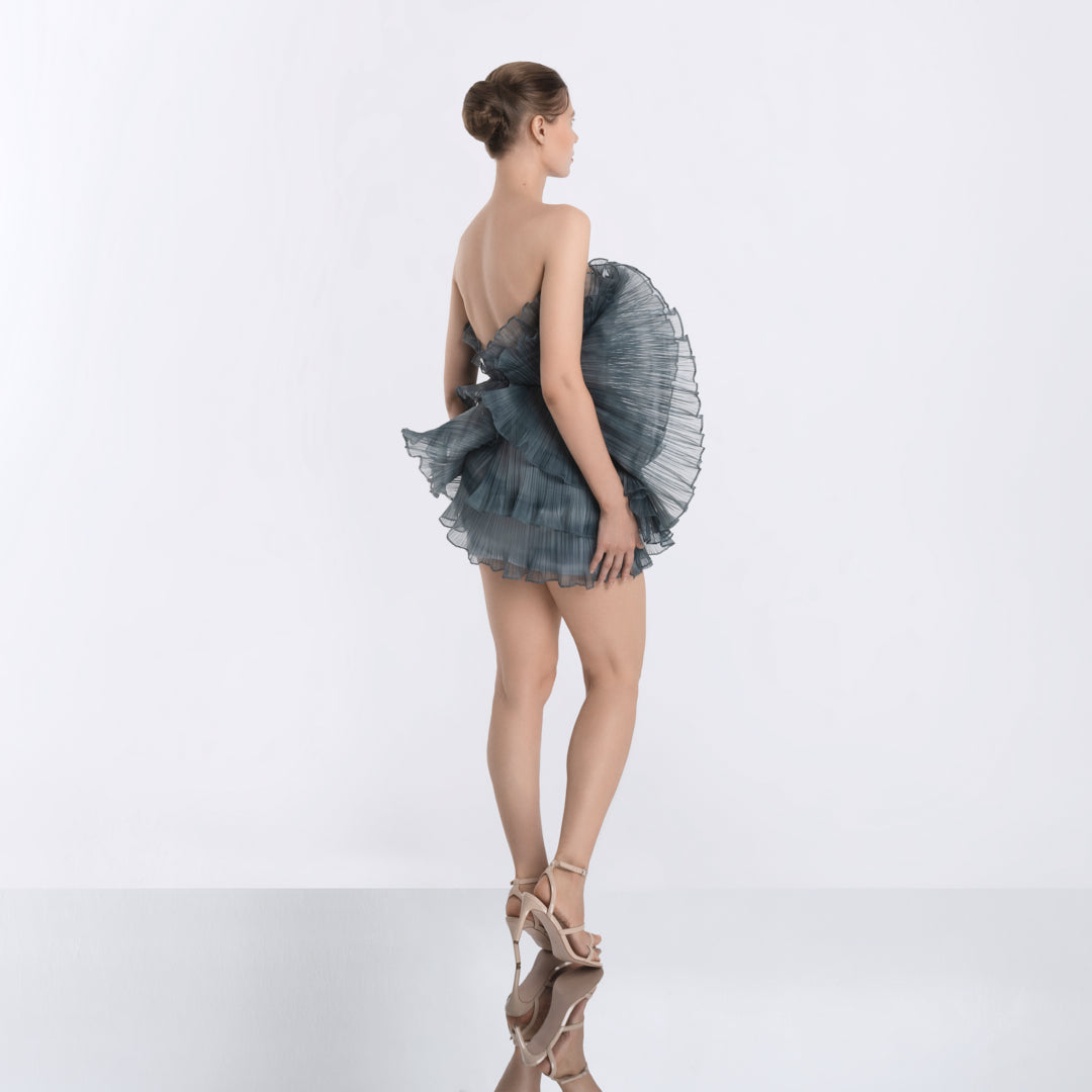 Romantic sculptural  dress in motion, strapless grey mini dress by Hong Kong fashion designer Lola Clavel
