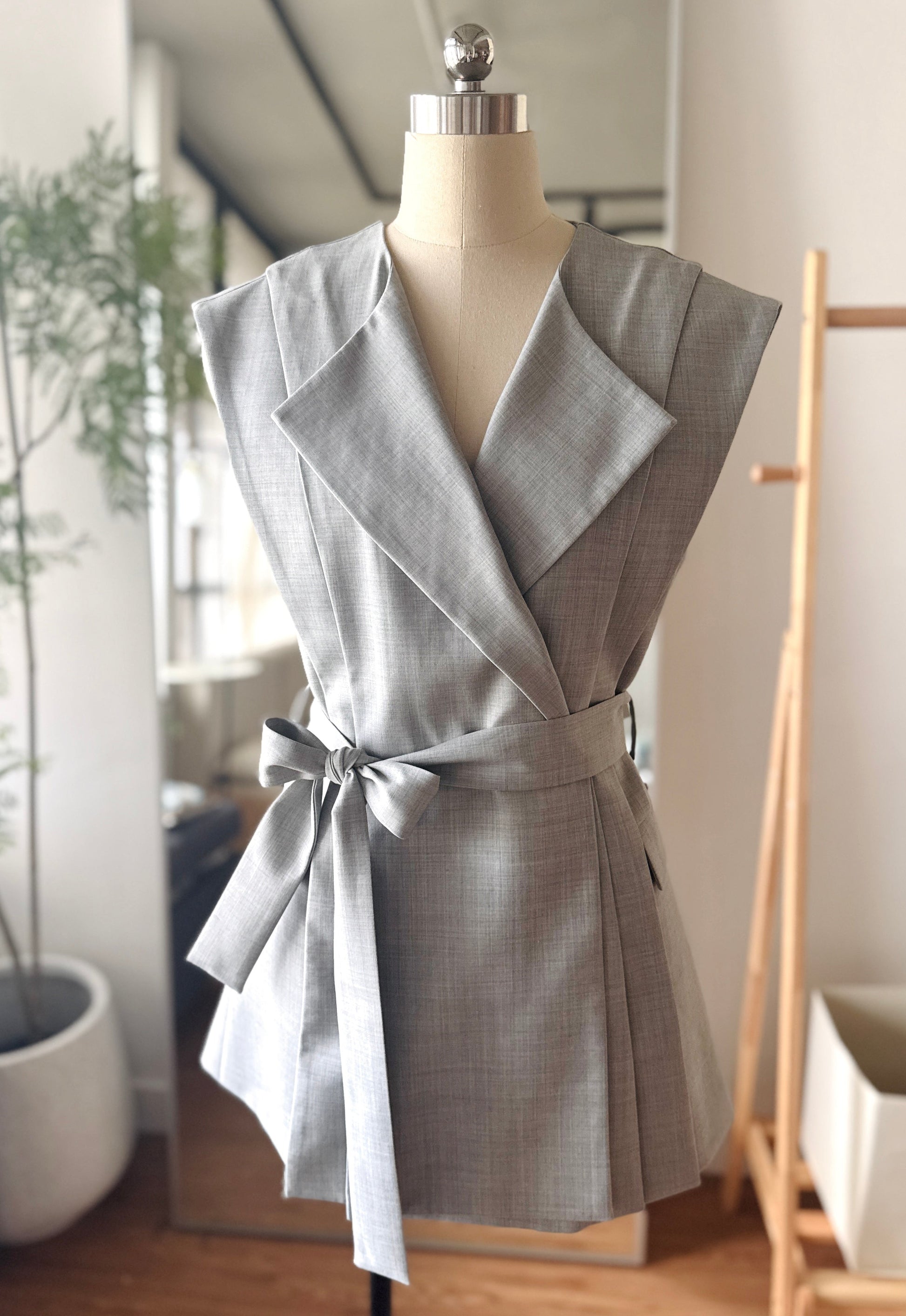 Tailored grey vest with clean modern lines by Lola Clavel Atelier, made in Hong Kong.